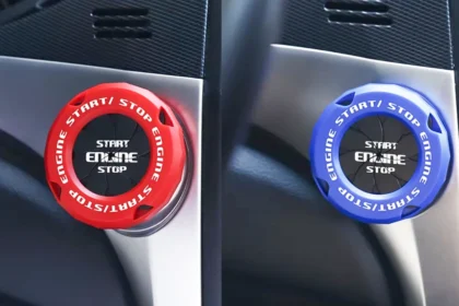 Close-up of a stylish car engine start button cover with bling design, installed on dashboard for interior decoration and protection.