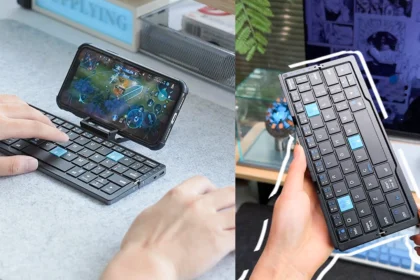 Compact foldable Bluetooth keyboard with durable aluminum design and magnetic stand on a tablet workstation.