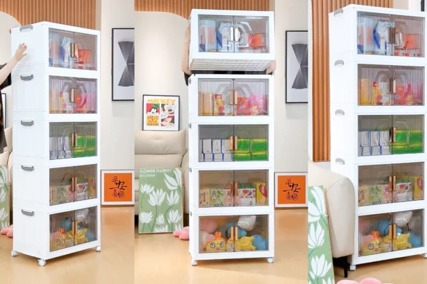 Foldable plastic storage box with wheels, stacked neatly against a door, featuring durable polypropylene material and a fold-flat design.
