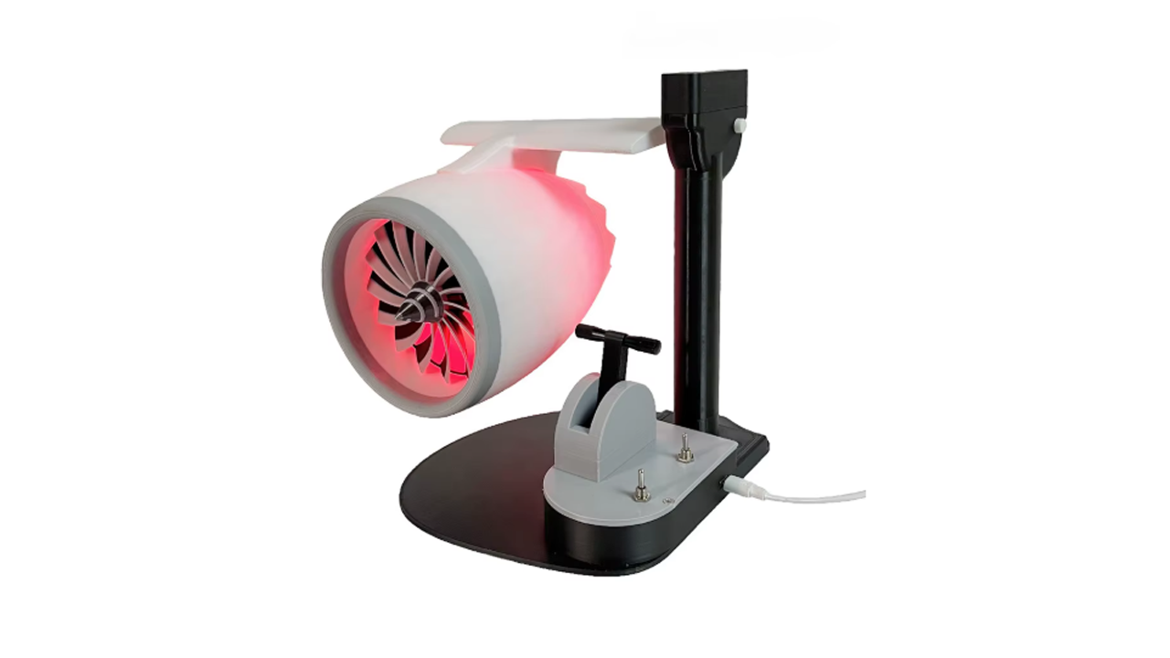 3D printed jet engine USB desk fan with LED lights and mist humidifier, designed as a quiet, powerful aviation-themed cooling gadget for office use.